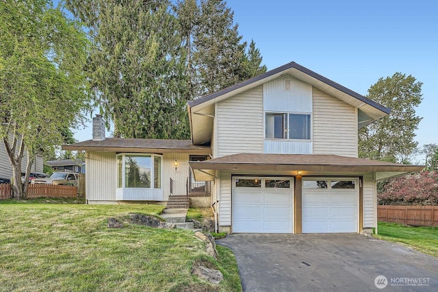 23238 21st Ave S, Des Moines, WA 98198 - split level home with an attached garage, driveway, a chimney, and roof with shingles