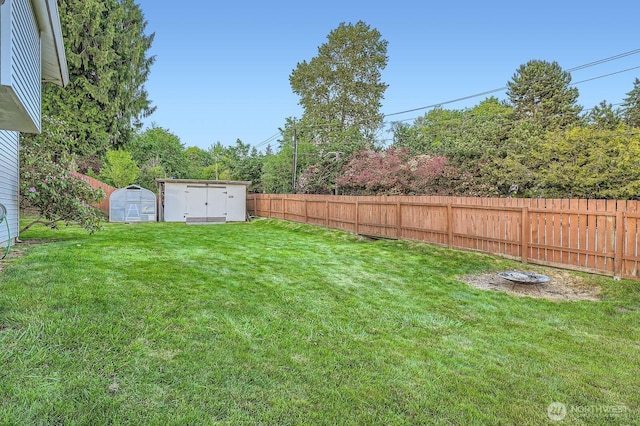 23238 21st Ave S, Des Moines, WA 98198 - view of yard with a storage shed and an outdoor structure