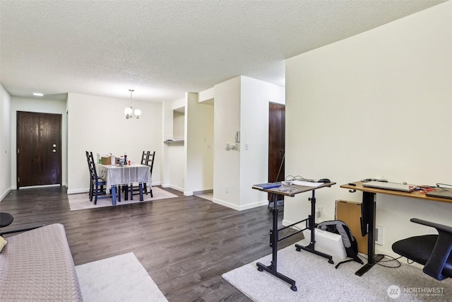 14650 NE 32nd St Unit A14, Bellevue, WA 98007 - office space featuring a textured ceiling, wood finished floors, a chandelier, and baseboards