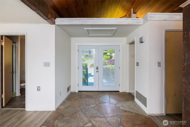 228 Skagit Way, La Conner, WA 98257 - entrance foyer with wooden ceiling, french doors, and baseboards