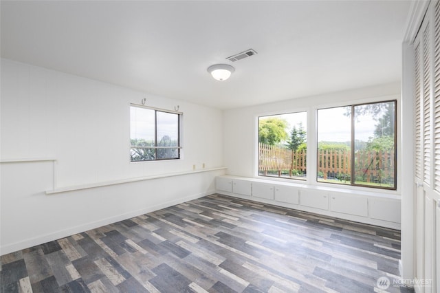228 Skagit Way, La Conner, WA 98257 - empty room featuring plenty of natural light and wood finished floors