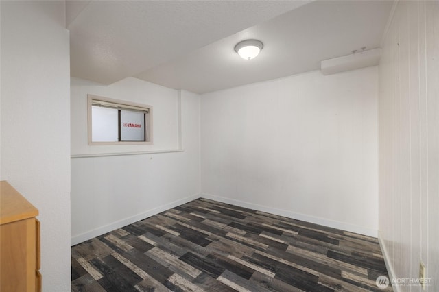 228 Skagit Way, La Conner, WA 98257 - spare room with dark wood-type flooring and baseboards