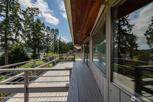 228 Skagit Way, La Conner, WA 98257 - wooden deck featuring view of scattered trees