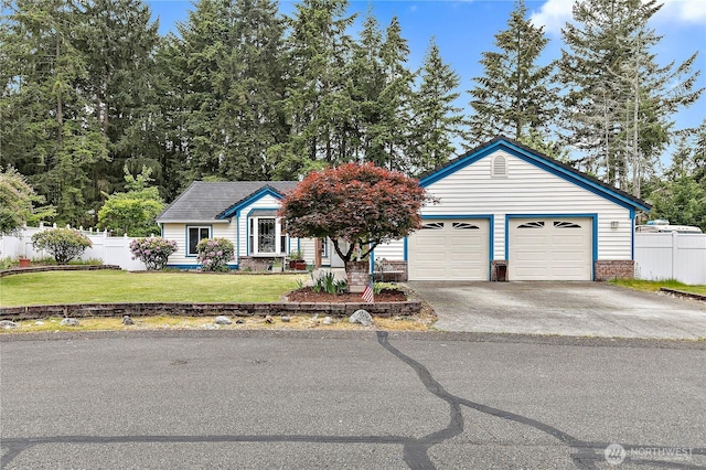 19414 112th Ave E, Graham, WA 98338 - view of front of house with a garage and driveway