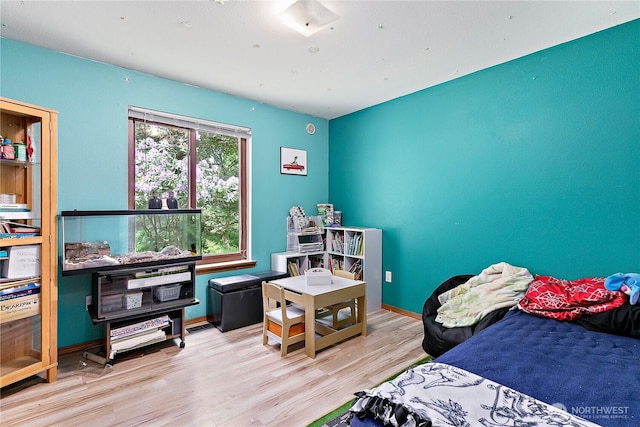 19414 112th Ave E, Graham, WA 98338 - bedroom with wood finished floors and baseboards