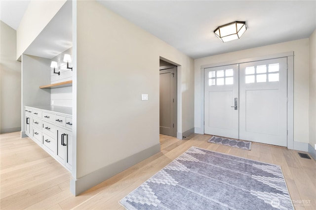 1248 Kanaka Bay Rd, Friday Harbor, WA 98250 - entryway with light wood-type flooring and baseboards
