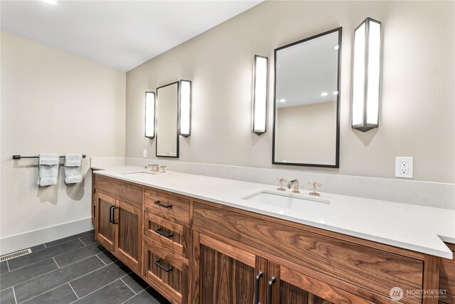1248 Kanaka Bay Rd, Friday Harbor, WA 98250 - full bathroom featuring double vanity, tile patterned floors, and baseboards