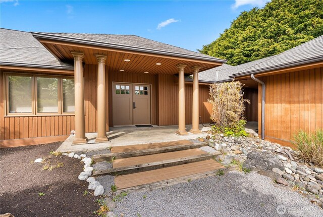 1248 Kanaka Bay Rd, Friday Harbor, WA 98250 - entrance to property featuring roof with shingles and a porch