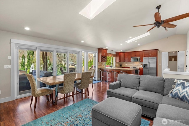 250 Lakefront Dr, Orondo, WA 98843 - living room featuring a skylight, dark wood-style floors, vaulted ceiling, plenty of natural light, and recessed lighting