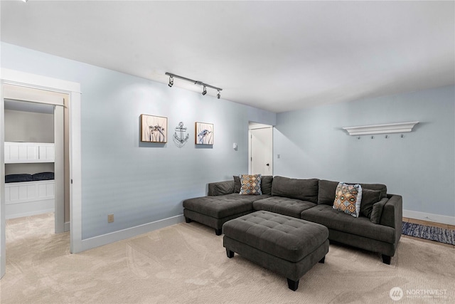250 Lakefront Dr, Orondo, WA 98843 - living area featuring light colored carpet, baseboards, and track lighting