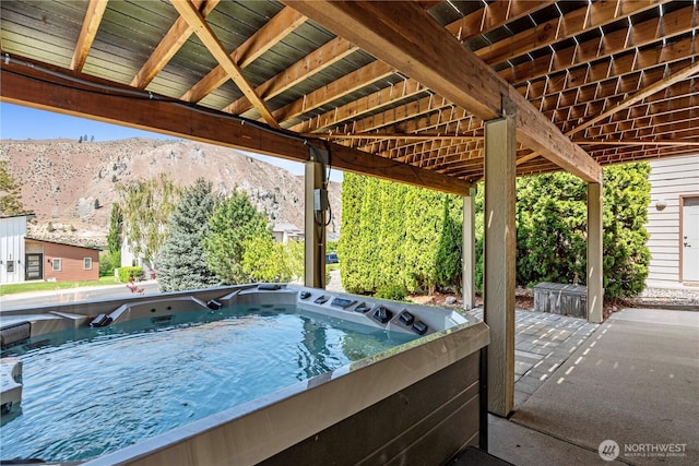 250 Lakefront Dr, Orondo, WA 98843 - view of patio / terrace featuring a mountain view and a hot tub