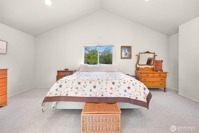 8894 Giles Rd, Blaine, WA 98230 - bedroom featuring light colored carpet, lofted ceiling, baseboards, and recessed lighting