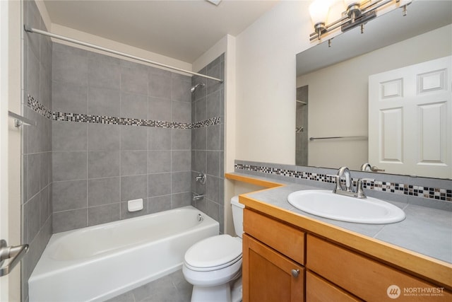 13426 97th Ave E Unit 303, Puyallup, WA 98373 - full bathroom featuring toilet,  shower combination, vanity, and tile patterned floors