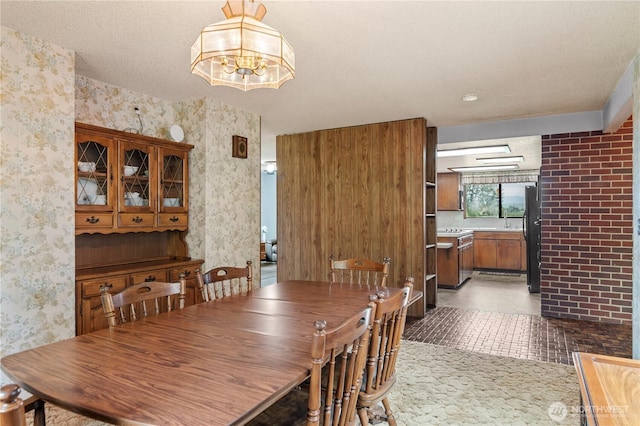 1826 156th St NE, Arlington, WA 98223 - dining area featuring wallpapered walls and a chandelier
