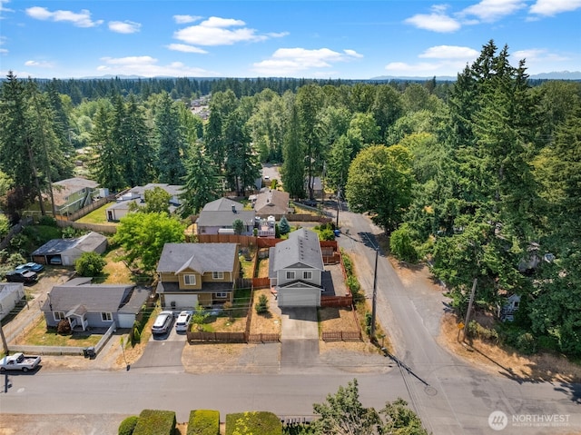10102 Barnes Ln S, Tacoma, WA 98444 - aerial perspective of suburban area with a forest