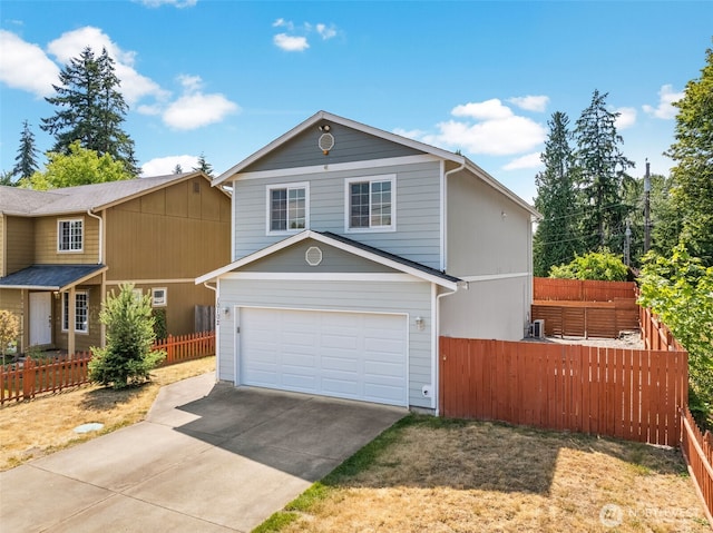 10102 Barnes Ln S, Tacoma, WA 98444 - traditional-style house featuring concrete driveway and an attached garage