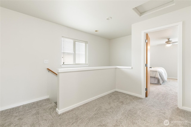 9402 187th St E, Puyallup, WA 98375 - carpeted empty room featuring baseboards and attic access