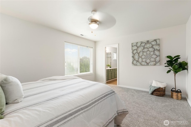 9402 187th St E, Puyallup, WA 98375 - bedroom featuring light carpet, baseboards, a ceiling fan, and ensuite bathroom