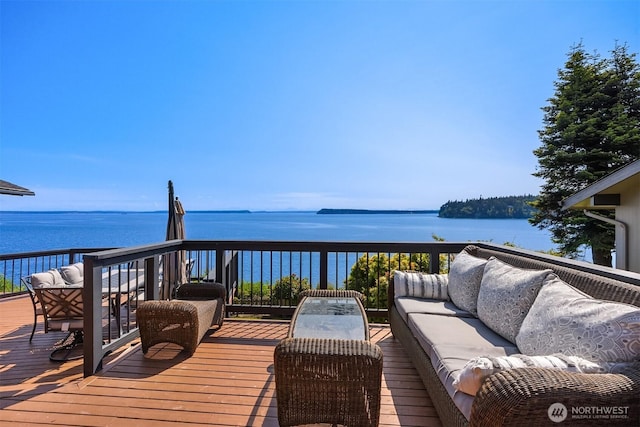 161 Montgomery Ln, Port Ludlow, WA 98365 - wooden terrace with an outdoor hangout area and a water view