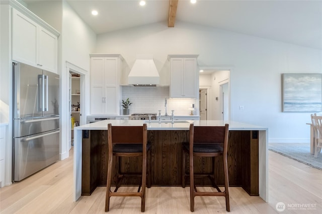 53 Daybreak Rd, Walla Walla, WA 99362 - kitchen with high end refrigerator, premium range hood, light wood-style flooring, light countertops, and recessed lighting