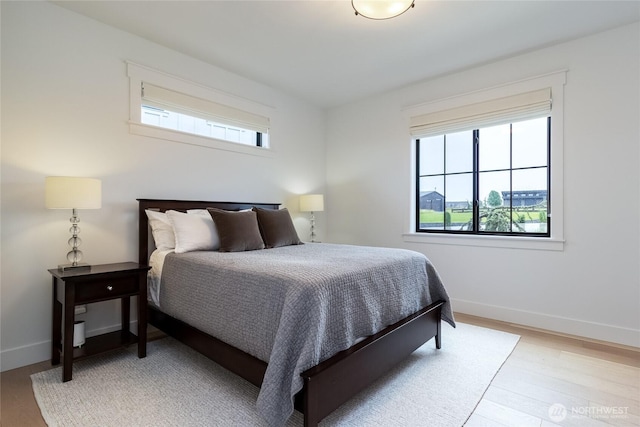 53 Daybreak Rd, Walla Walla, WA 99362 - bedroom with light wood finished floors and baseboards