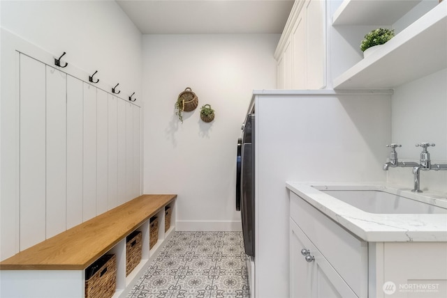 53 Daybreak Rd, Walla Walla, WA 99362 - laundry area with cabinet space and baseboards