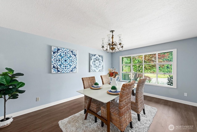 12043 184th Ave NE, Redmond, WA 98052 - dining space with a chandelier, a textured ceiling, and wood finished floors