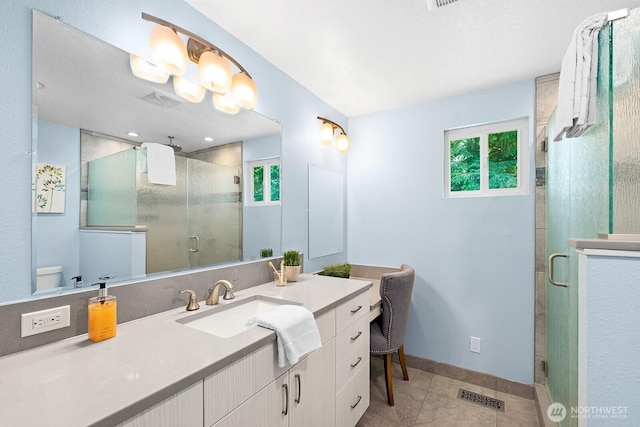 12043 184th Ave NE, Redmond, WA 98052 - bathroom with vanity, a stall shower, and tile patterned floors