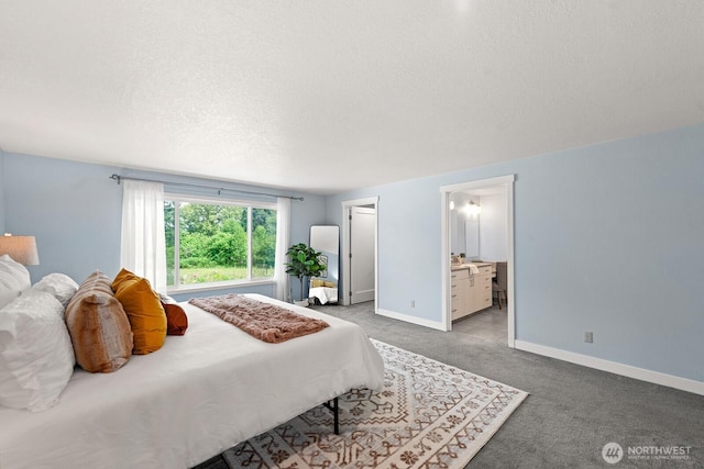 12043 184th Ave NE, Redmond, WA 98052 - bedroom with a textured ceiling, light colored carpet, and ensuite bathroom