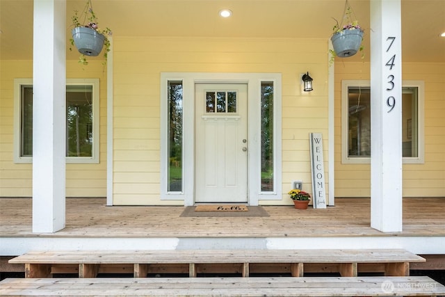 entrance to property with covered porch