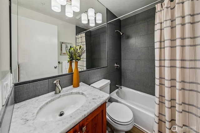 2432 Dexter Ave N Unit 201, Seattle, WA 98109 - full bathroom featuring toilet, shower / tub combo with curtain, vanity, and a chandelier