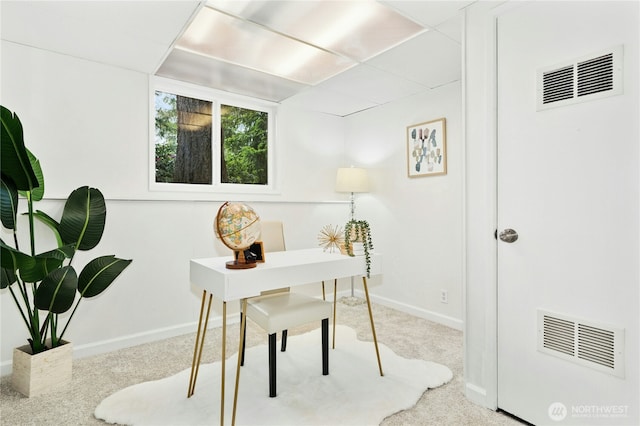 carpeted office with baseboards
