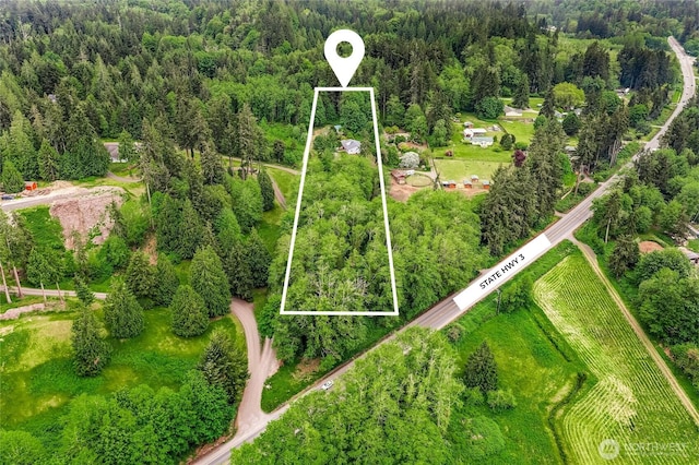 28824 State Highway 3 NE, Poulsbo, WA 98370 - aerial view of property's location featuring property boundaries highlighted and a forest