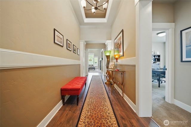 371 Reserve Way, Walla Walla, WA 99362 - hall featuring a desk, a chandelier, baseboards, and dark wood finished floors