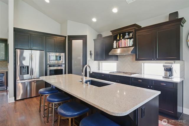 371 Reserve Way, Walla Walla, WA 99362 - kitchen with stainless steel appliances, a sink, under cabinet range hood, beverage cooler, and dark wood-type flooring