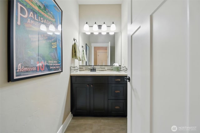 371 Reserve Way, Walla Walla, WA 99362 - bathroom featuring vanity, backsplash, and baseboards