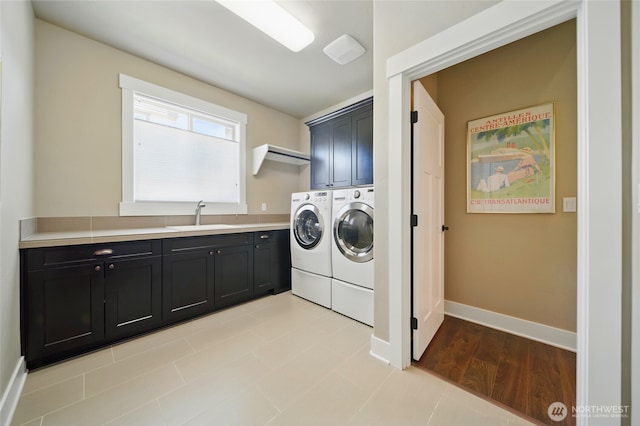 371 Reserve Way, Walla Walla, WA 99362 - washroom featuring cabinet space, washing machine and clothes dryer, and baseboards