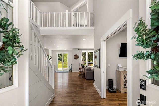 12915 212th St SE, Snohomish, WA 98296 - foyer featuring wood finished floors, stairway, a high ceiling, and recessed lighting