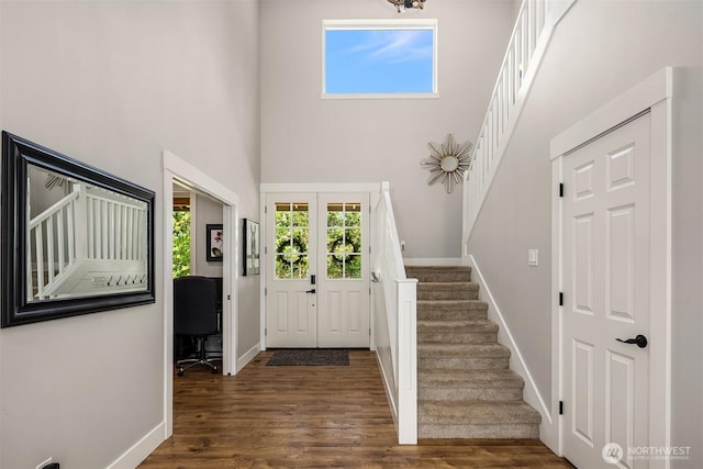 12915 212th St SE, Snohomish, WA 98296 - foyer with stairs, baseboards, wood finished floors, and a towering ceiling