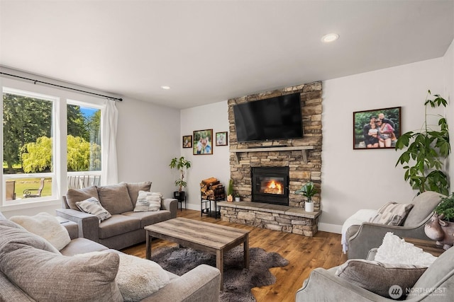 12915 212th St SE, Snohomish, WA 98296 - living area featuring a fireplace, baseboards, wood finished floors, and recessed lighting
