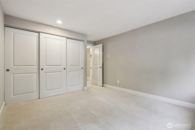 4515 125th Ave SE Unit B308, Bellevue, WA 98006 - unfurnished bedroom with carpet, baseboards, a closet, and recessed lighting