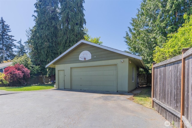 detached garage with fence