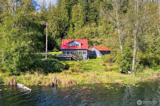 893 Snow Creek Rd, Quilcene, WA 98376 - rear view of property with metal roof, a water view, stairway, and a wooded view