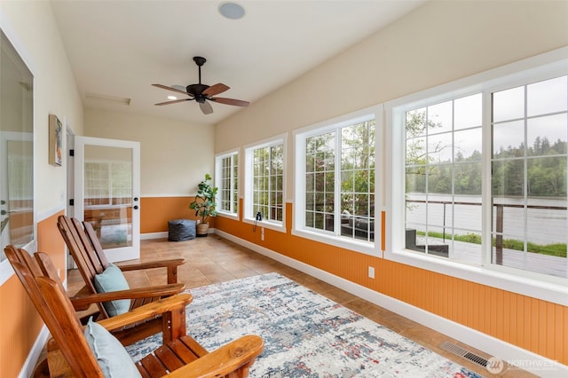 893 Snow Creek Rd, Quilcene, WA 98376 - sunroom featuring baseboards, tile patterned floors, and french doors