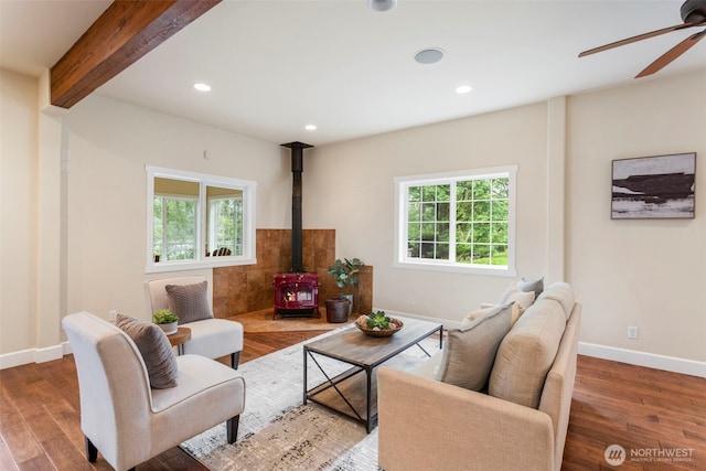893 Snow Creek Rd, Quilcene, WA 98376 - living area with a wood stove, baseboards, plenty of natural light, a ceiling fan, and recessed lighting
