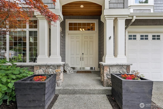 2947 275th Ave SE, Sammamish, WA 98075 - doorway to property with a porch and a garage