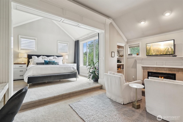 2947 275th Ave SE, Sammamish, WA 98075 - bedroom with vaulted ceiling, a glass covered fireplace, crown molding, and carpet