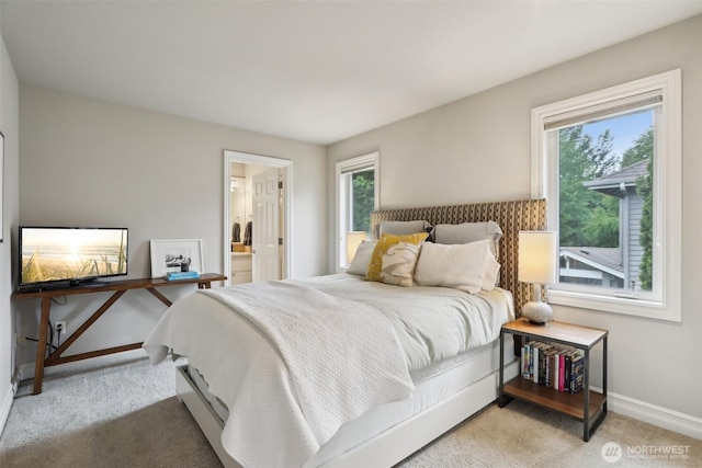 2947 275th Ave SE, Sammamish, WA 98075 - bedroom featuring light colored carpet, baseboards, and ensuite bath