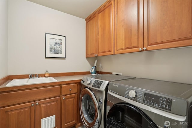 2947 275th Ave SE, Sammamish, WA 98075 - laundry area with cabinet space and washer and dryer