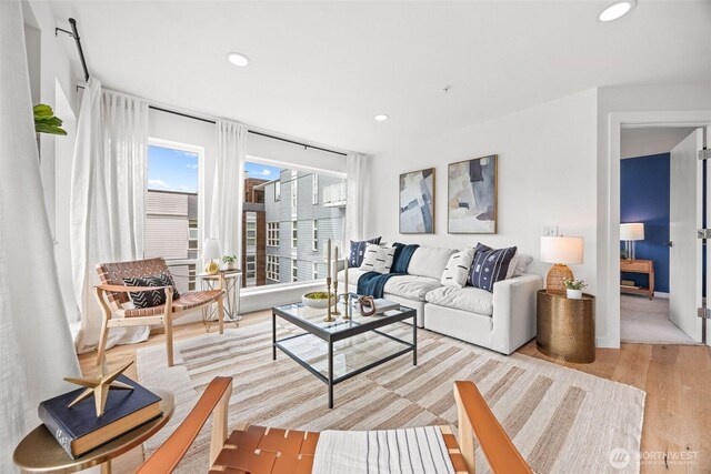 323 Queen Anne Ave N Unit 502, Seattle, WA 98109 - living area with light wood-type flooring and recessed lighting
